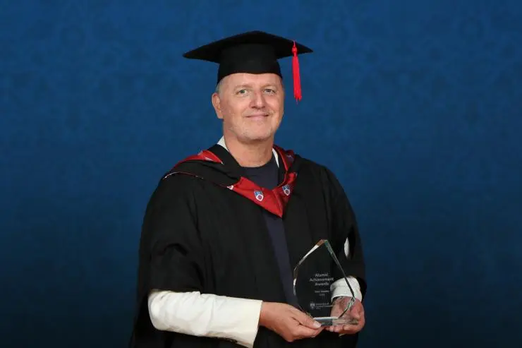 Gary Aspden with his Alumni Achievement Award