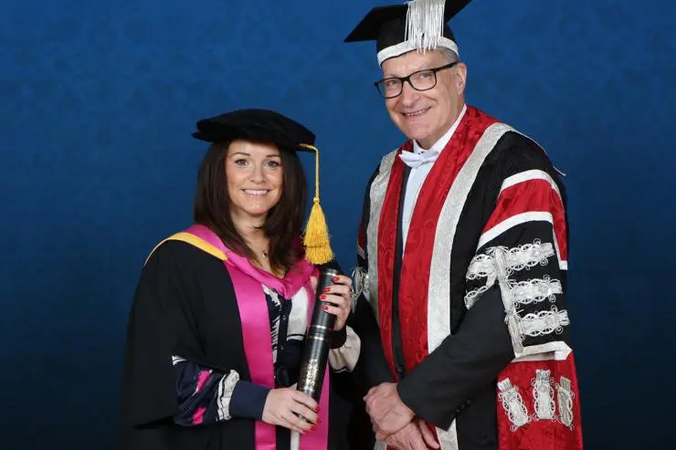 Dr Natalie Kenny with University of Central Lancashire Vice-Chancellor, Professor Graham Baldwin.