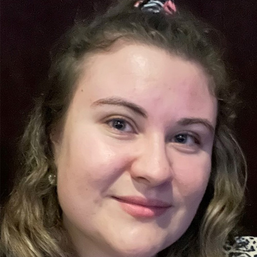 selfie photo of a student with long hair