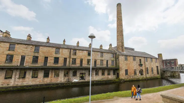 Enjoy a canal-side walk past Sandygate Mill.