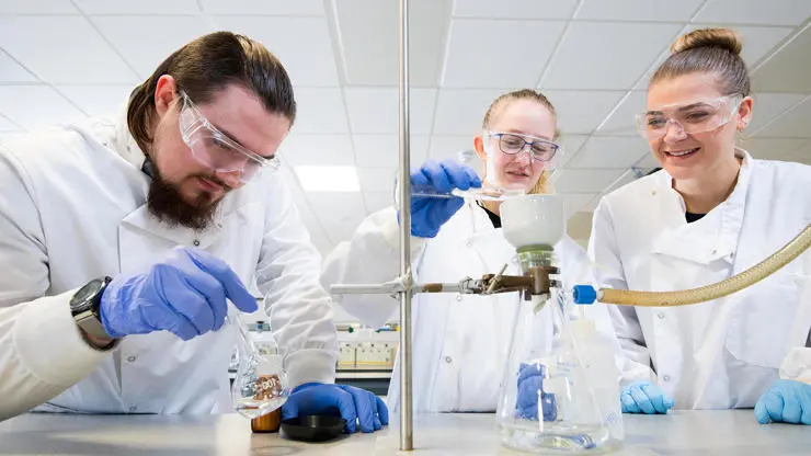 Experiment being conducted in our Chemistry Laboratory