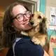 Photo of Sophie-Jade smiling with dog