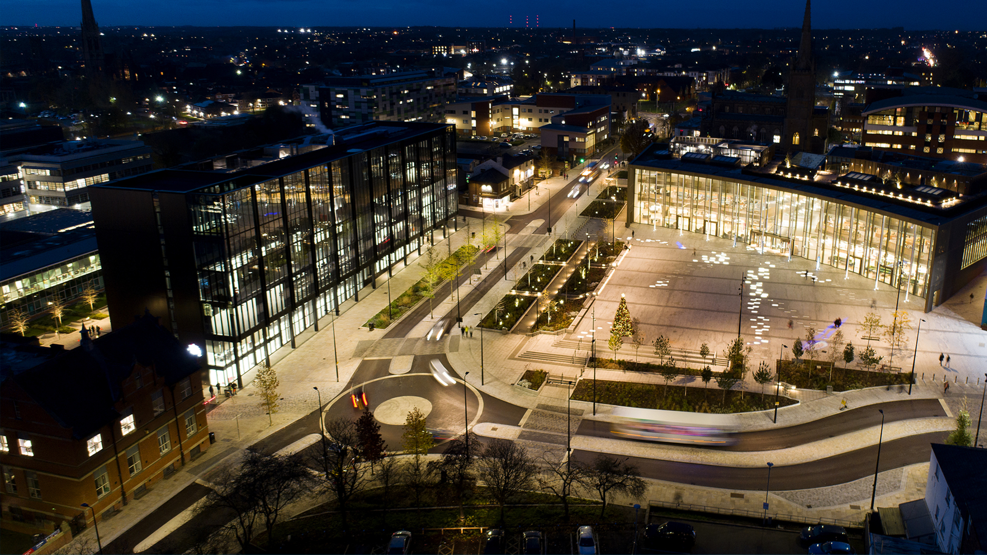 university square and the student centre at night with christmas tree