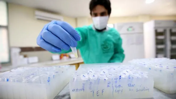 Babar Shazad processing blood samples for analysis