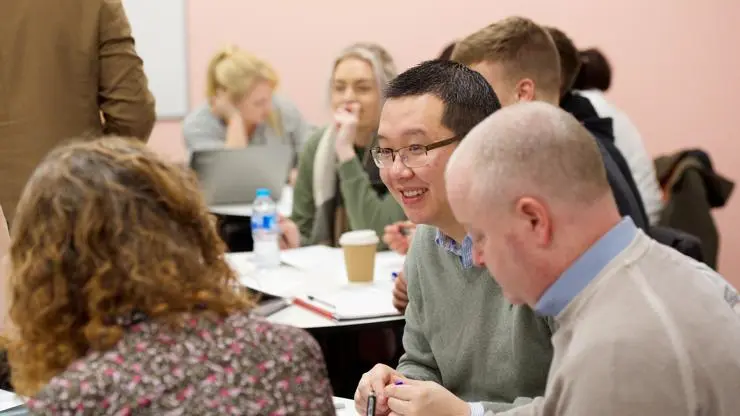 A group discussion in a workshop setting