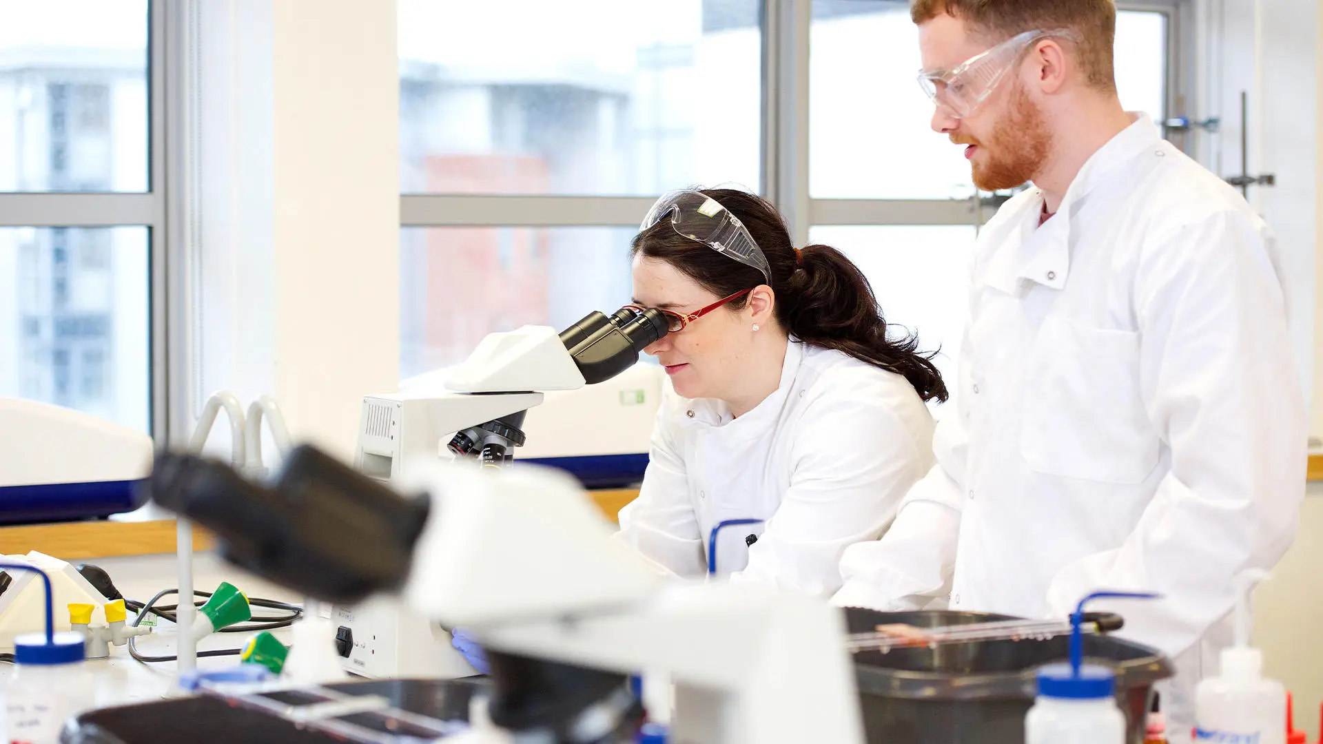 Molecular biophysics researchers in lab