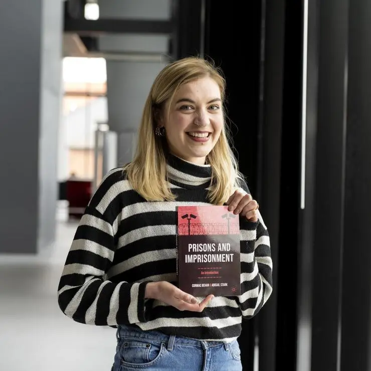 Criminology lecturer Abigail Stark co-authored 'Prisons and Imprisonment: An Introduction" with Cormac Behan.