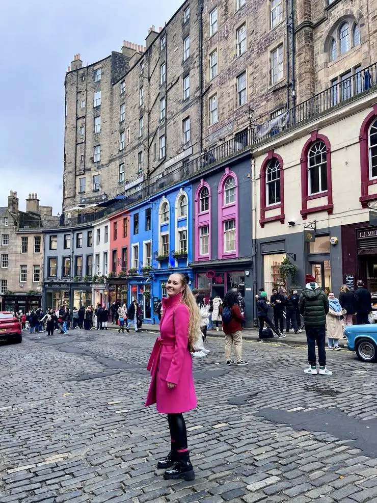 Maya in a colourful street in Edinburgh