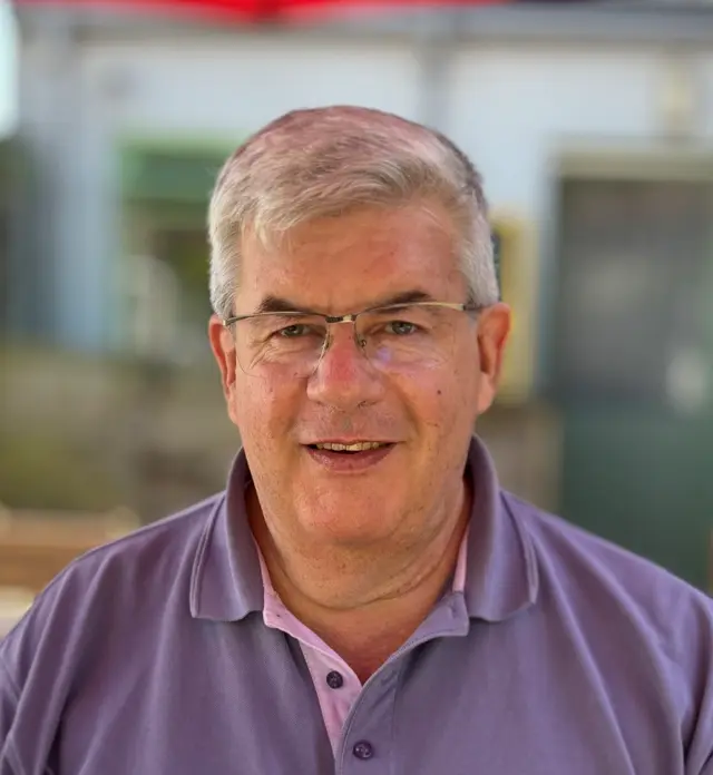 Headshot of Dr Frank J Harrington