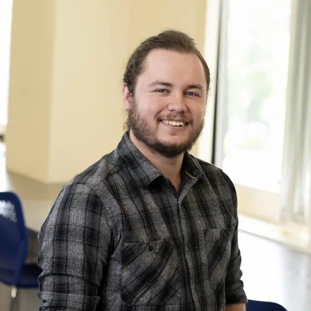 Headshot of Joshua G Rawstron