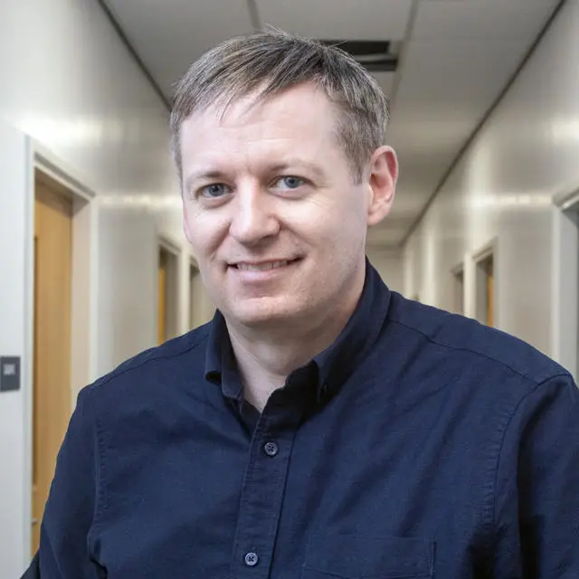Headshot of Dr John Lockhart