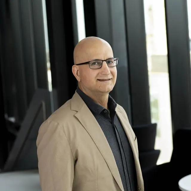 Headshot of Dr Essa Anas