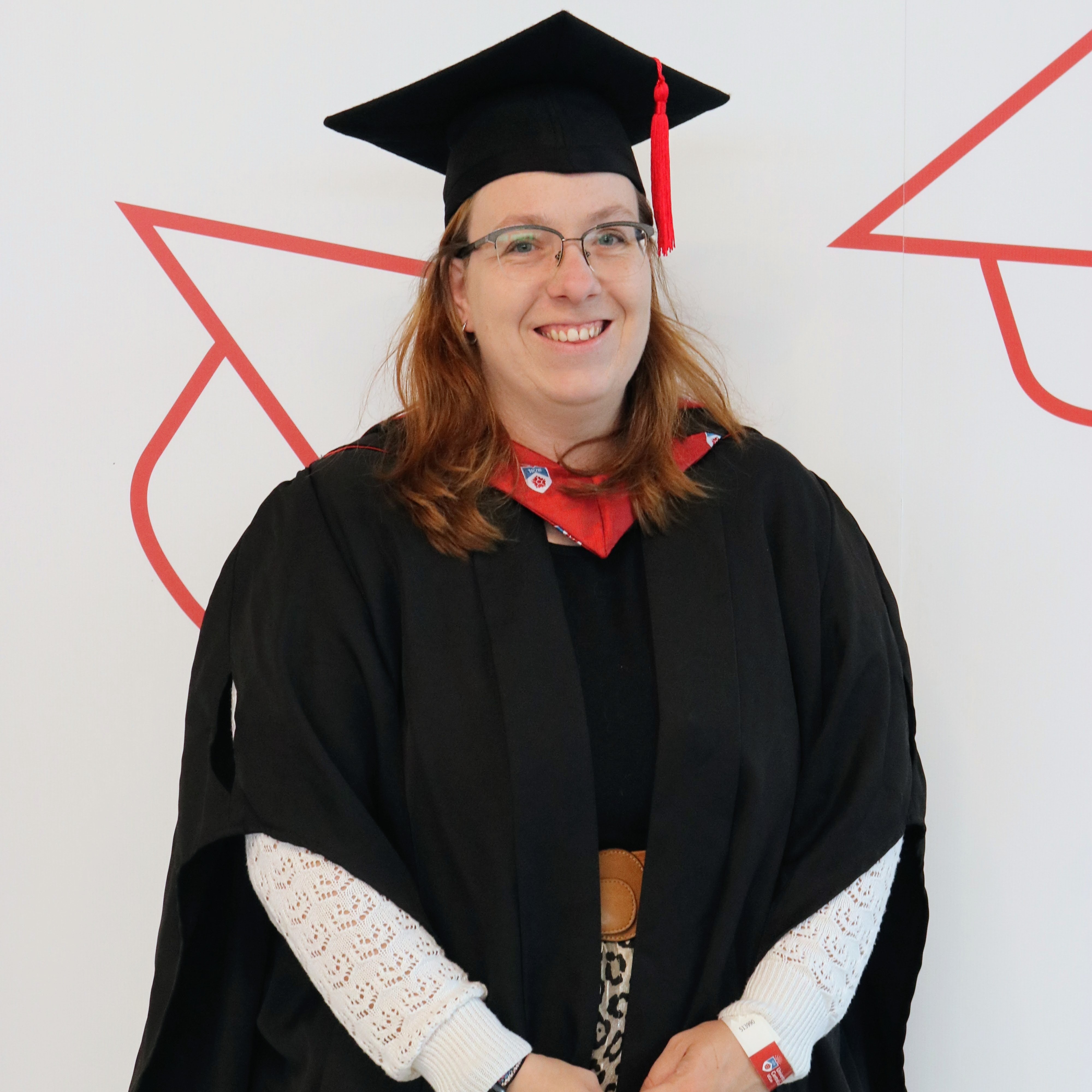 A photo of Katrina Greenwood at graduation.