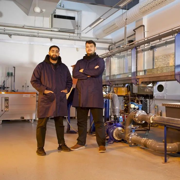 Omran and Mohammed stood in the lab.