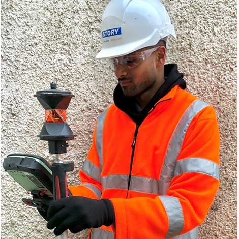 sufyan in a hard hat and high visibility jacket