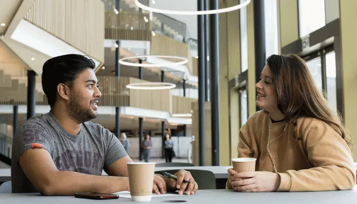 Students using social and study spaces in the student centre