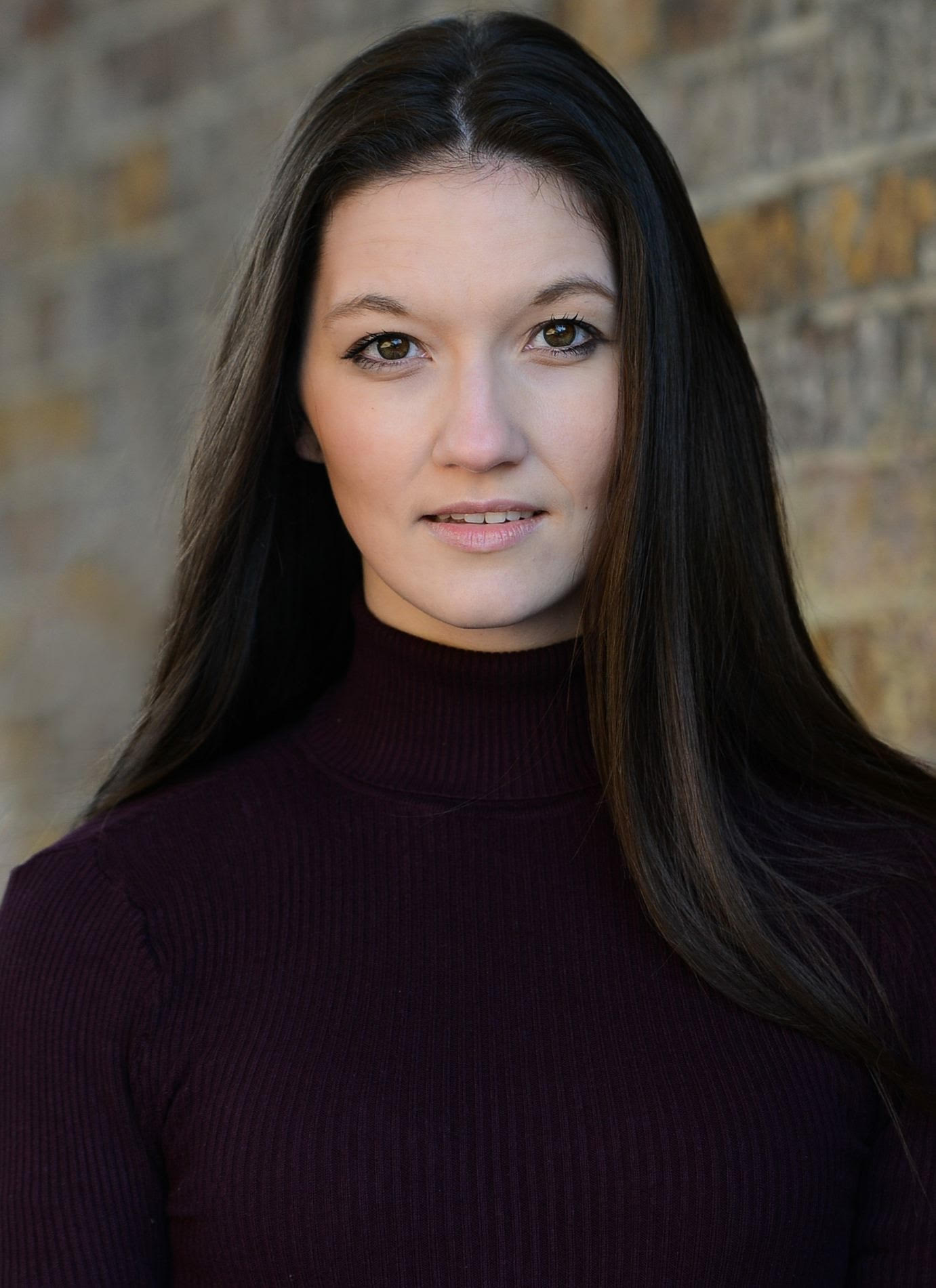 Abby Restall in a purple jumper
