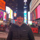 Sports Journalism student Adam Proud standing in Times Square, New York City
