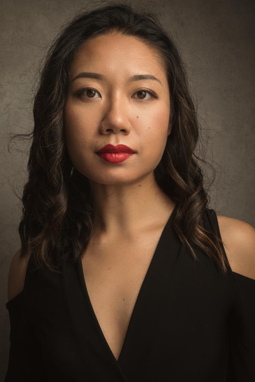 Zoe Yan in a black dress