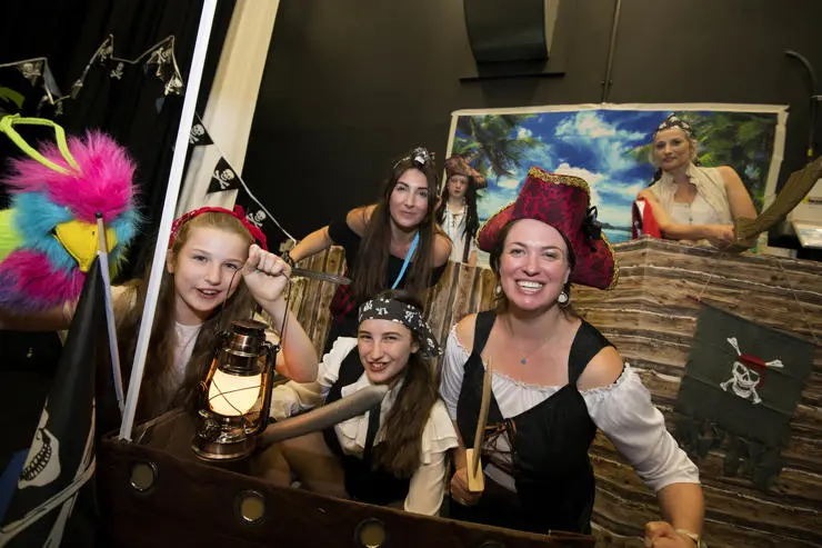Some of the performers with a child.