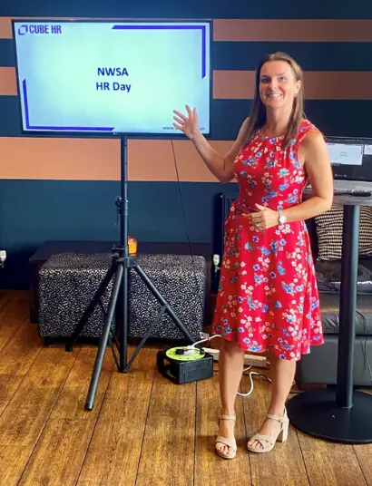 Lisa Sourbutts speaking at a HR Day for CUBE HR. 