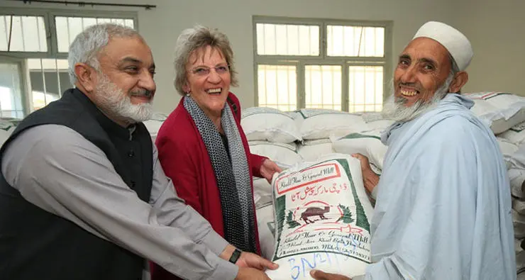 Helen Bingley visiting the new flour storage facility in our study community.