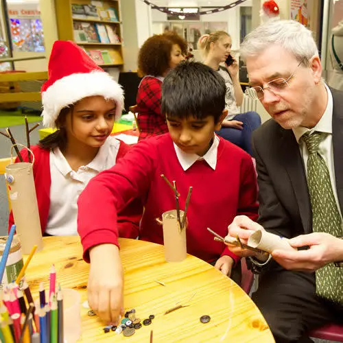 VC Mike Thomas with local schoolchildren
