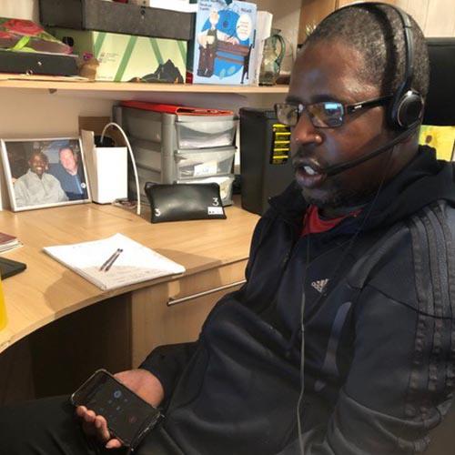 Lenny Johnrose at his computer