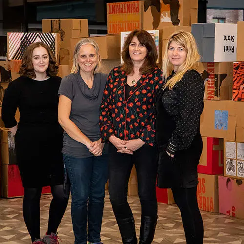 Organisers and artists with the installation