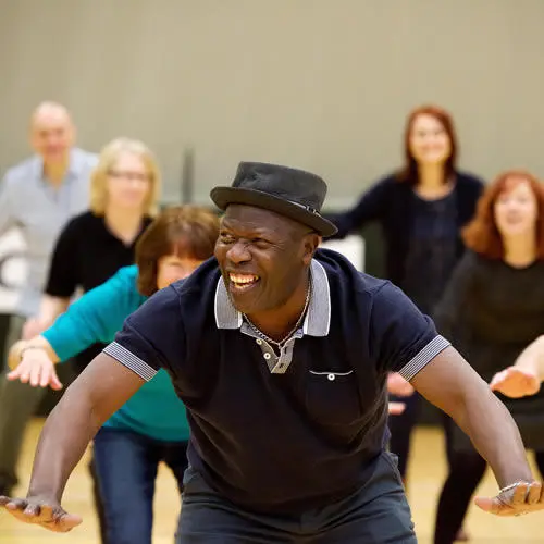  World Salsa Dance champion Phil Kaila lead the dancing