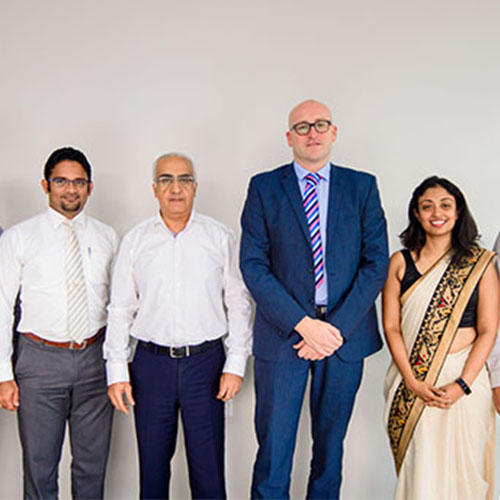 The core team at Universal College Lanka and Tim Steele