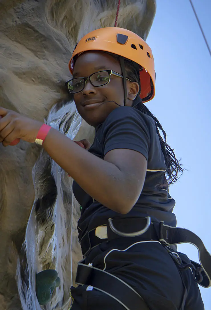 Ashton Community Science College pupil Reanne Jnobaptiste, 12, on the climbing wall.