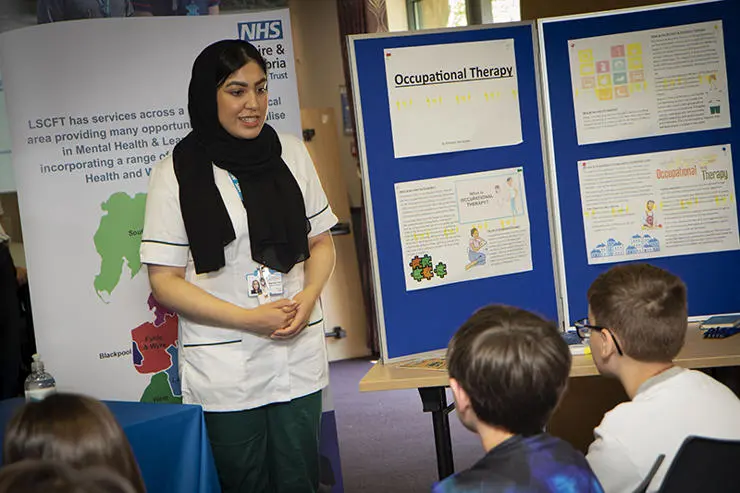 Weeton Primary School children listening to a talk by occupational therapist Zenab Akhtar.