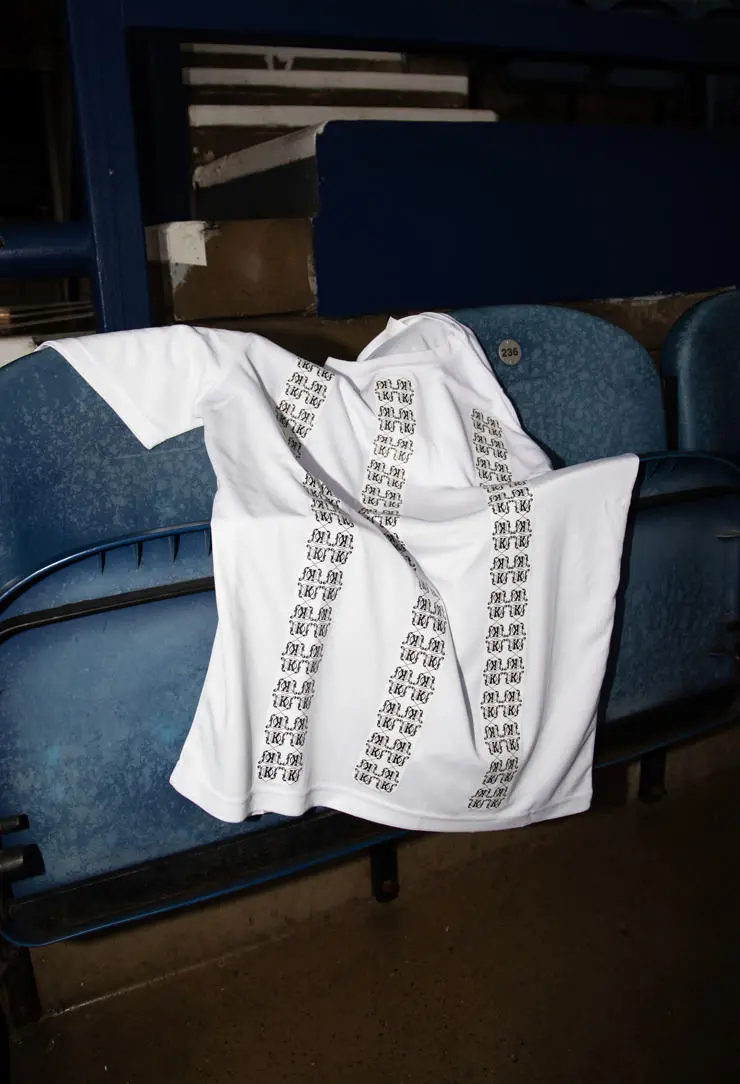 The shirt was designed by Kayleigh, a mirror and repeat of the Dick, Kerr emblem to form their iconic stripes.