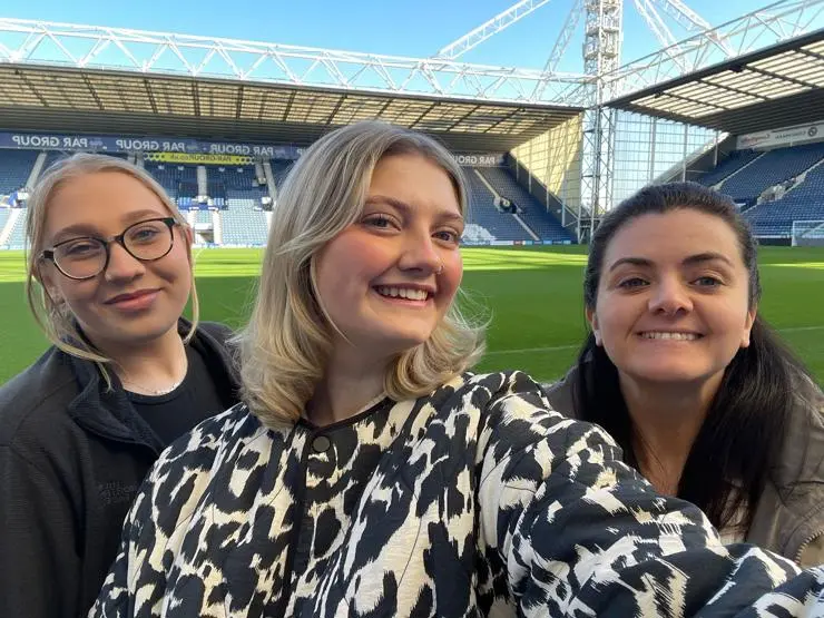 (L-R) Megan Lomax, Grace Shorrock and Kayleigh Atkinson pictured inside Preston North End’s ground.