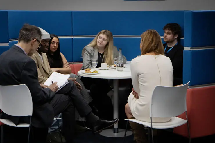 SMEs who have benefitted from the University's business support meet with the IOEE