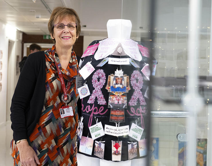 4.	BSc (Hons) Coaching, Counselling and Psychological Interventions student Janet Reed with her exhibition work. 