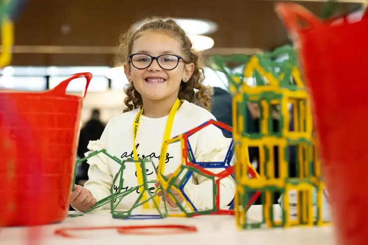 Lexie-Rae Marshall enjoying a hands-on building activity