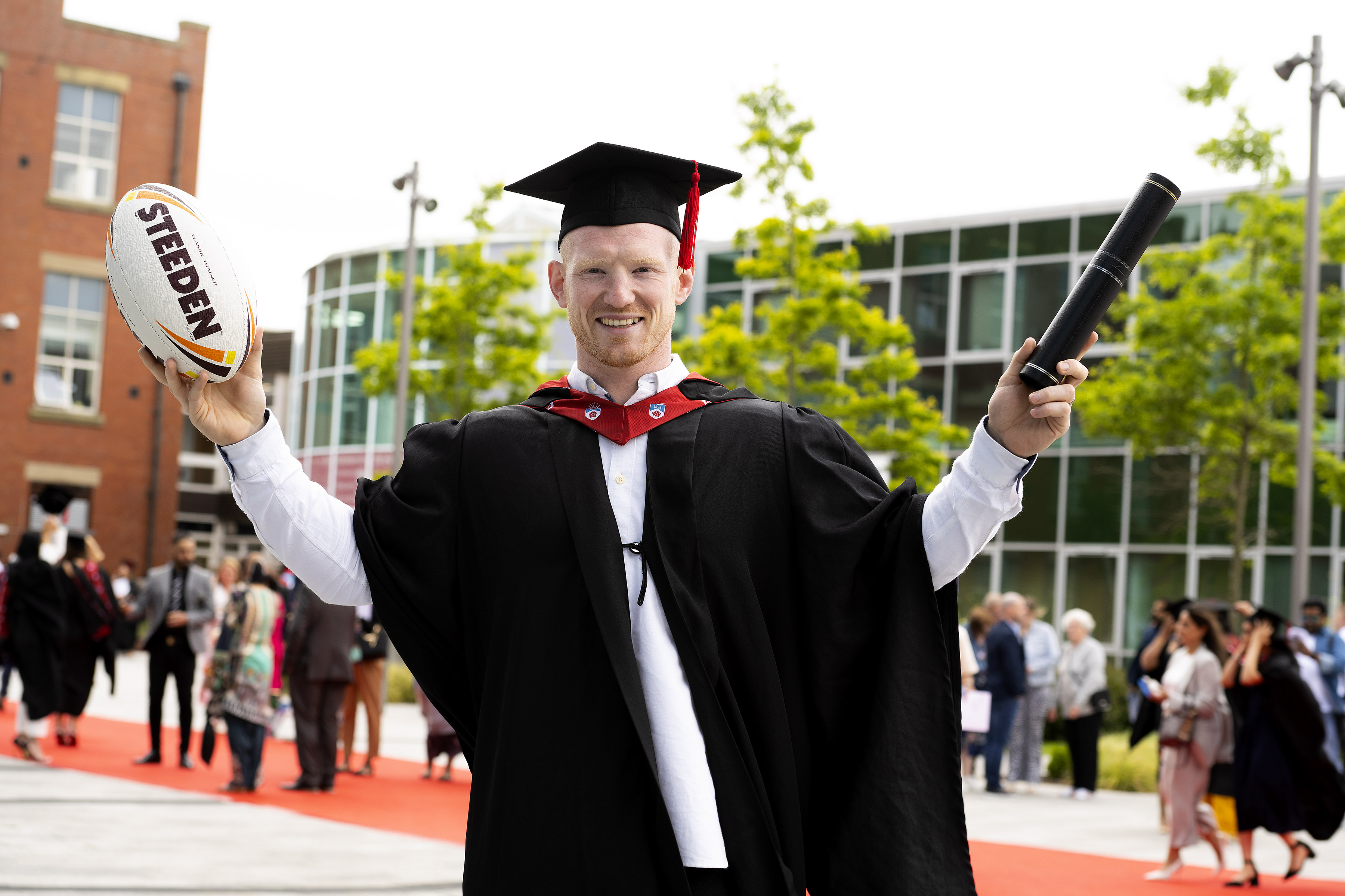 Wigan Warriors player Liam Farrell at his UCLan graduation ceremony