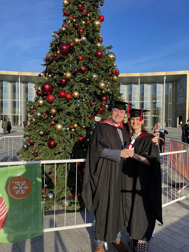 Peter McKiernan and his partner Jade Johnson outside of the UCLan Student Centre at their graduation ceremony.