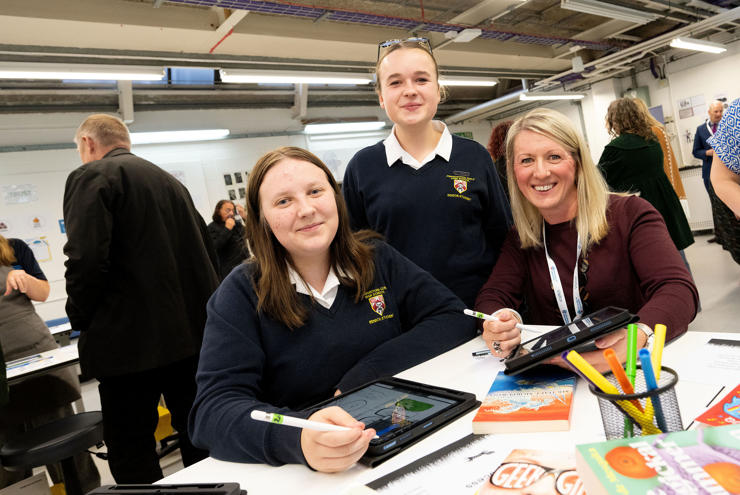 Helena McLintic (left) and Lily Taylor from Penwortham Girls High with Head of Art Emma Mitchell at the opening of the Young Creative Centre
