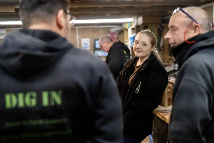 UCLan psychology student Ebonnie Field talks to veterans at Dig-in.