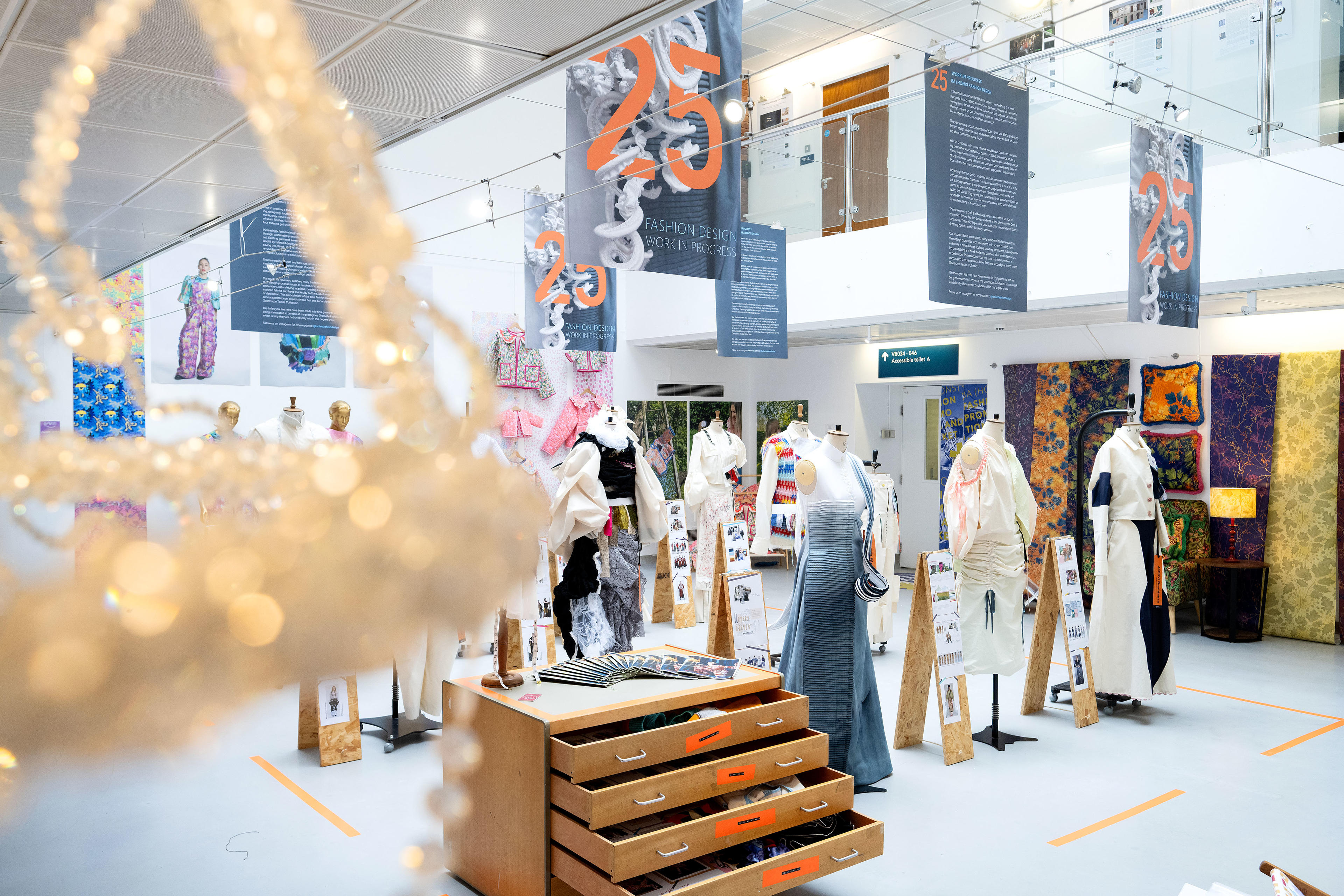 Art and textiles on display in a gallery