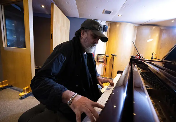 Anthony King, who worked on the song’s orchestral arrangements, piano, keyboards, organs and bass, rehearsing the song in UCLan’s Media Factory.