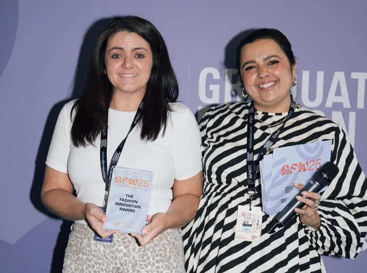 Kayleigh is presented with her award at Graduate Fashion Awards