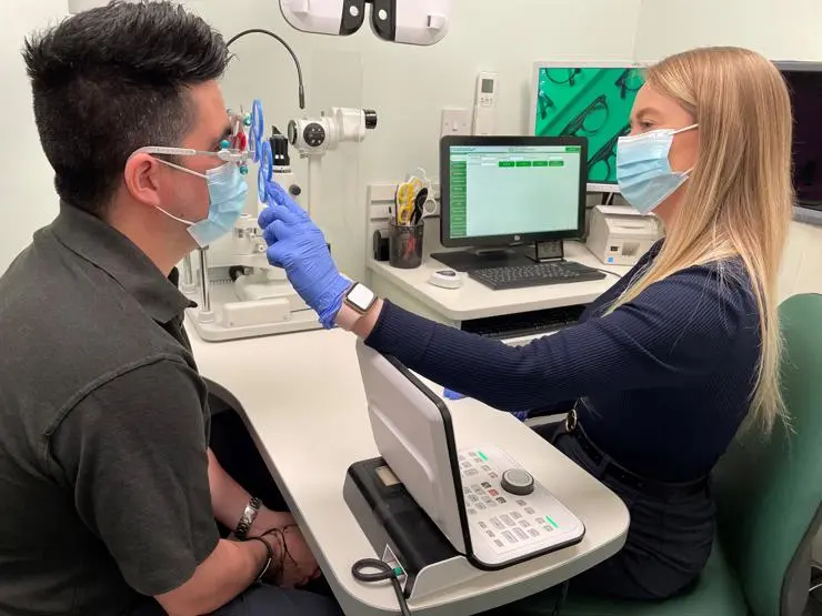 Katie Vickers examining a patient