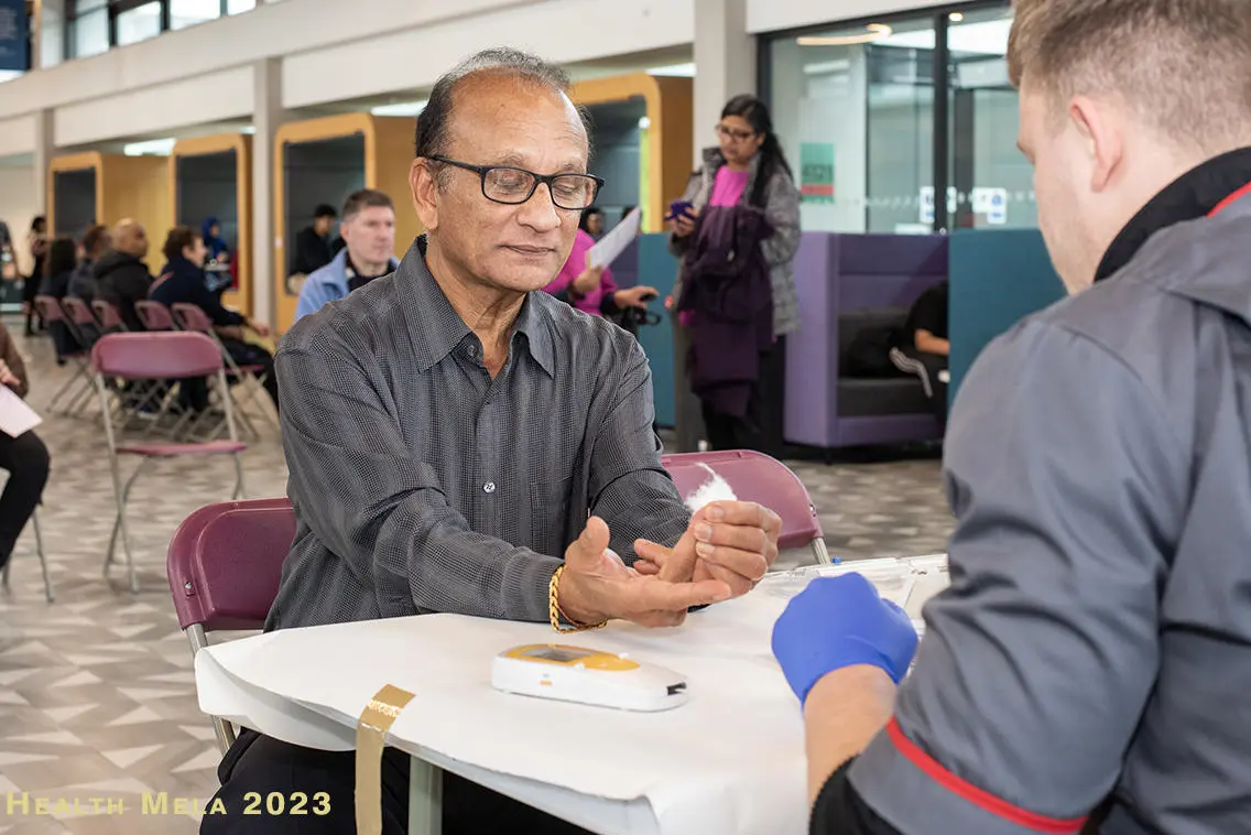 Man has a blood test at the Preston Health Mela