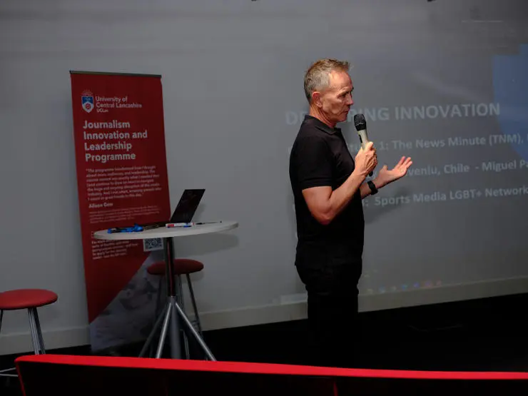 Director of the scholarship programme Dr François Nel speaks to participants
