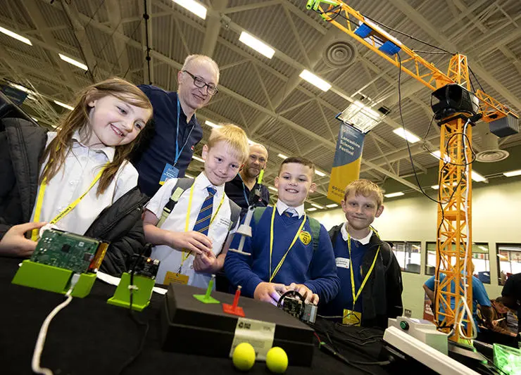 Pupils from Eldon Primary School move a Raspberry Pi powered crane