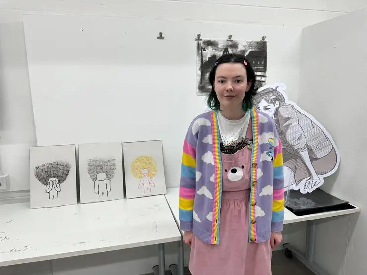 Illustration student, Holly Gallagher with her artwork